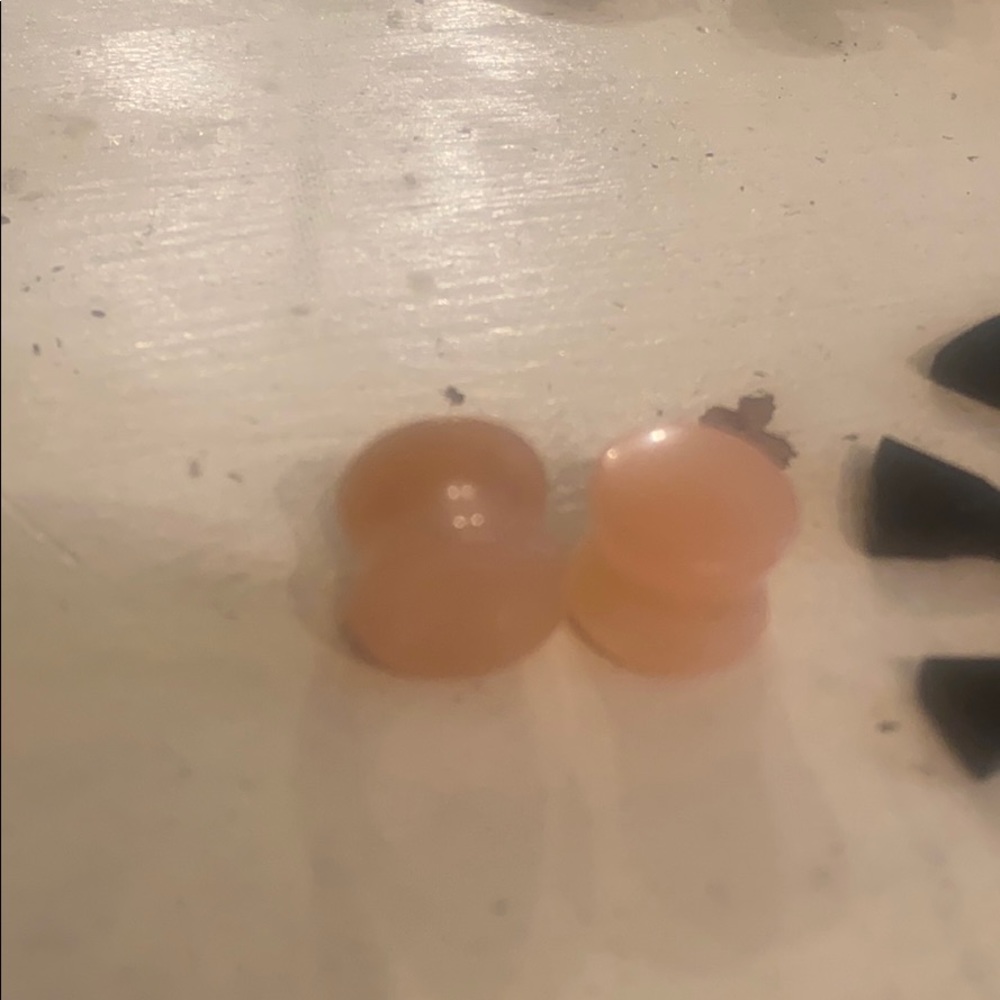 Beautiful peach colored stone plugs